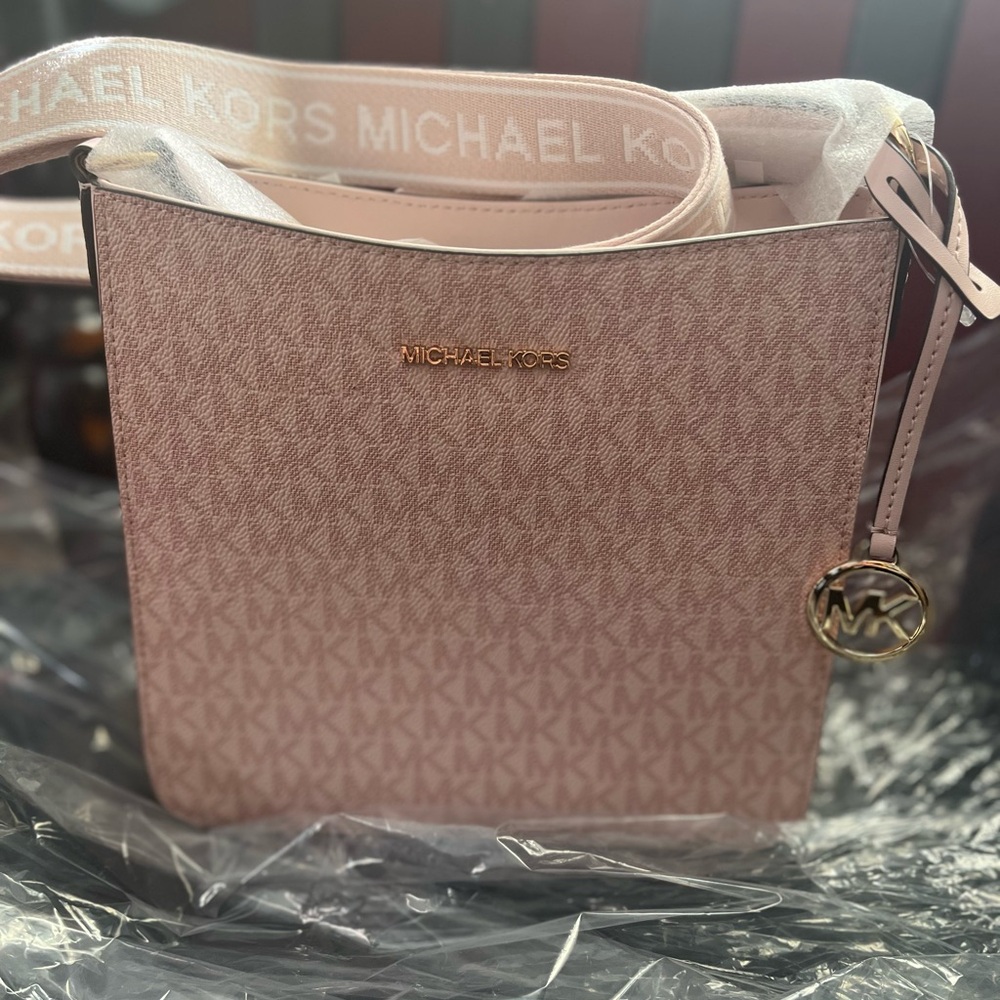 Not for sale. @Emily_mehalko
Michael Kors Blush Monogram Crossbody Bag